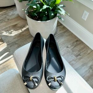Mini Melissa Black shoes with gold embellished bow, Size 2